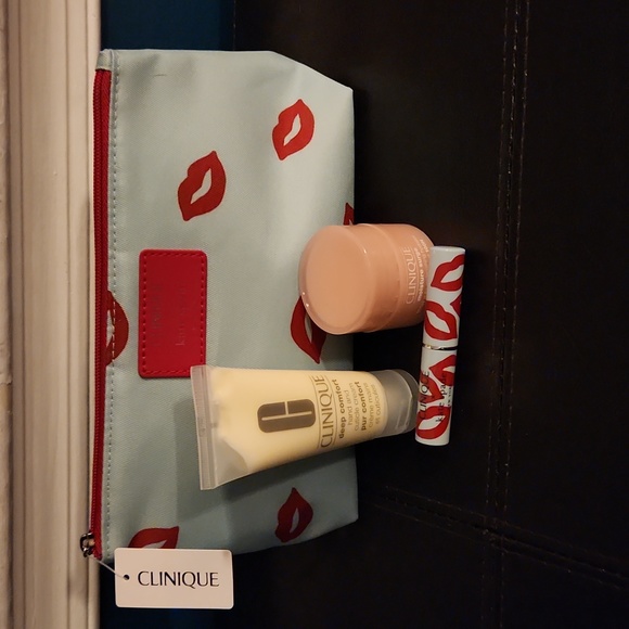 Clinique Handbags - New Clinique X Kate spade red lips cosmetic bag gift set